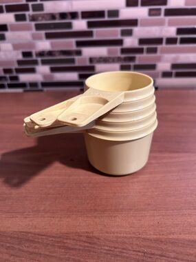 Stackable Yellow Tupperware Measuring Cups - Set of 5